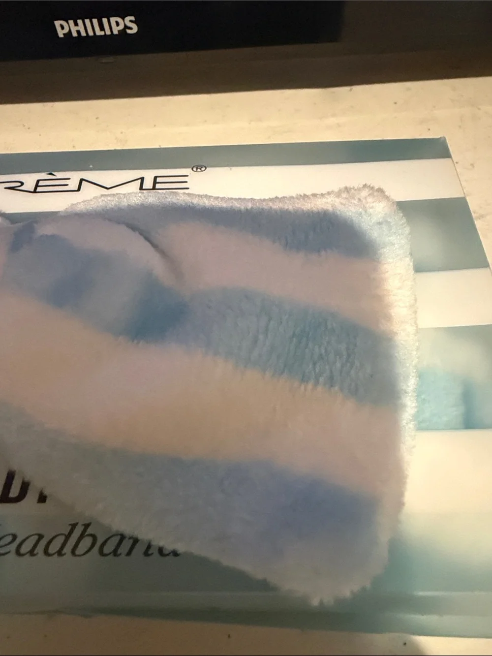 The Crème Plush Teddy Headband in Light Blue & White
